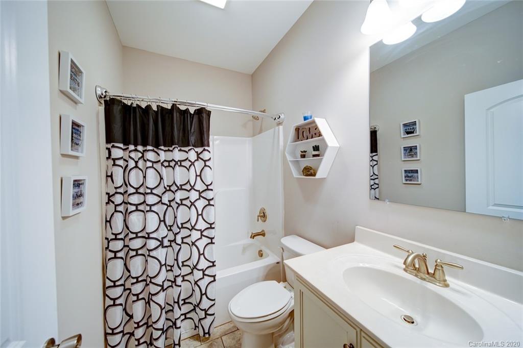 3018 Ranger Road Clover, SC 29710 - Photo 27 of 31 a bathroom with a sink toilet and shower