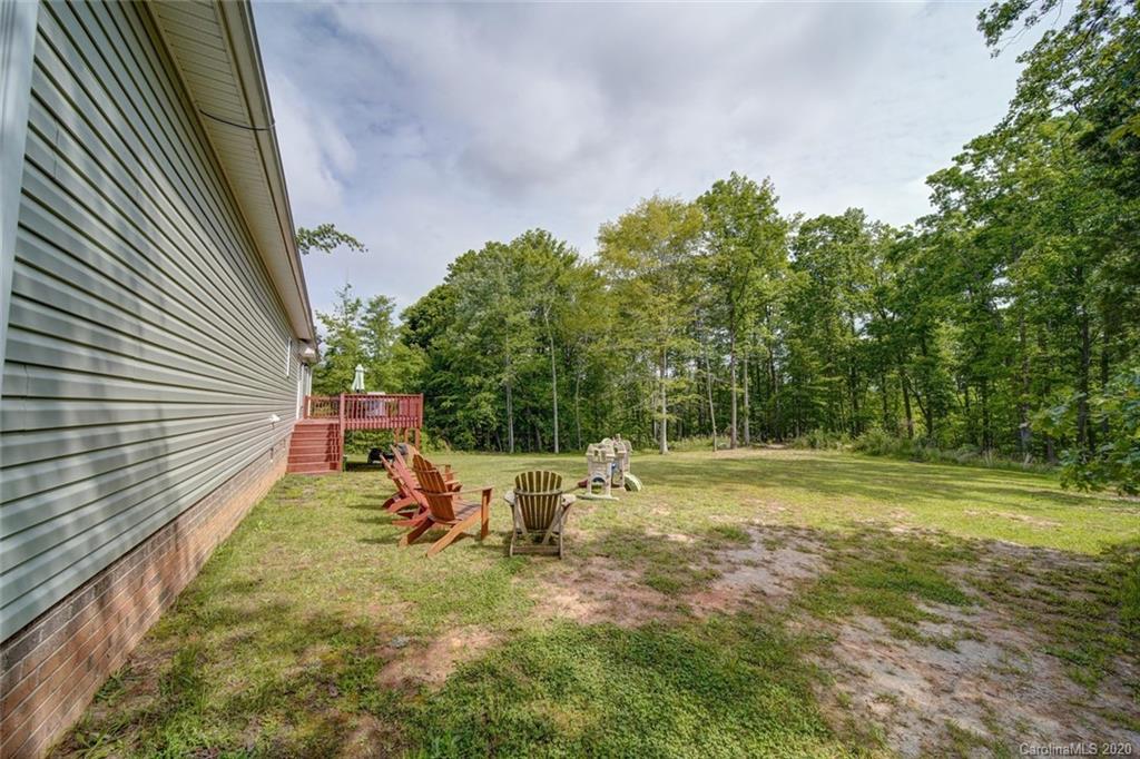 3018 Ranger Road Clover, SC 29710 - Photo 31 of 31 a backyard of a house with table and chairs