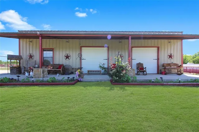 a view of a house with swimming pool and a porch