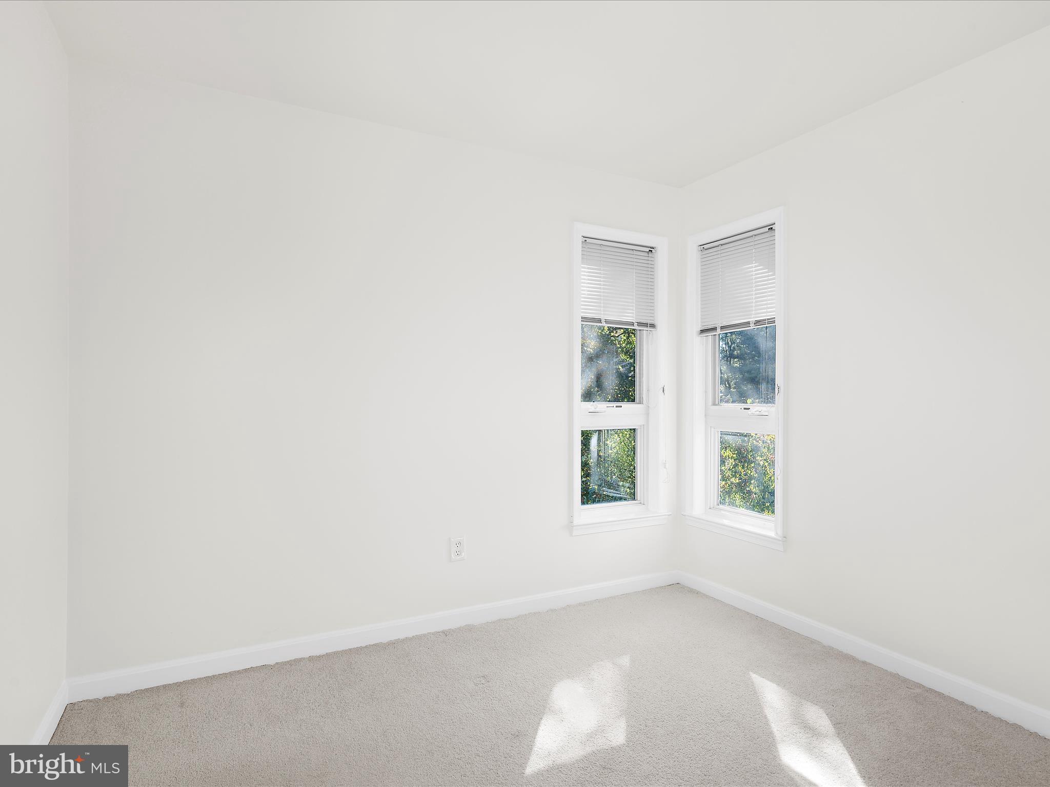 599 Oakland Hills Drive, Unit 3A Arnold, MD 21012 - Photo 15 of 31 an empty room with windows