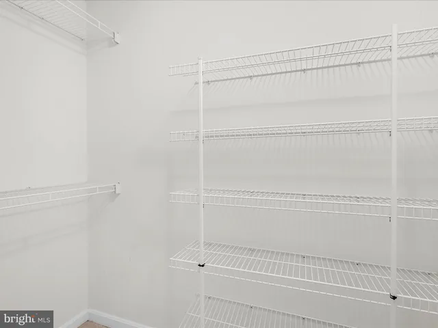 a bathroom with a shower and a bath tub