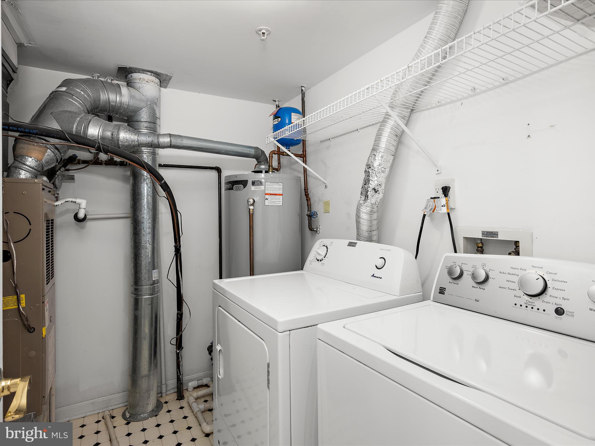 599 Oakland Hills Drive, Unit 3A Arnold, MD 21012 - Photo 25 of 31 a utility room with dryer and washer