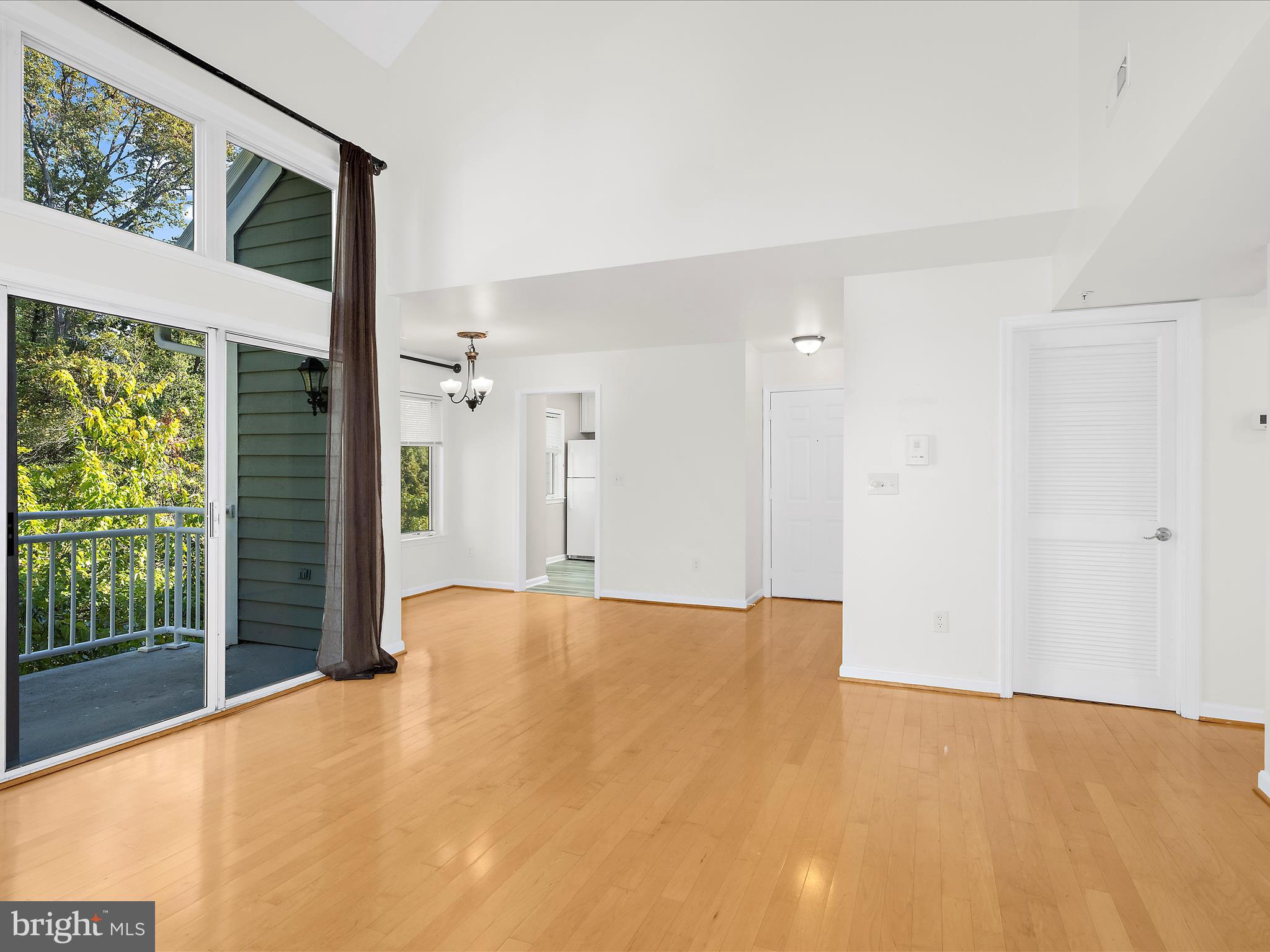 599 Oakland Hills Drive, Unit 3A Arnold, MD 21012 - Photo 7 of 31 a view of an empty room with a window
