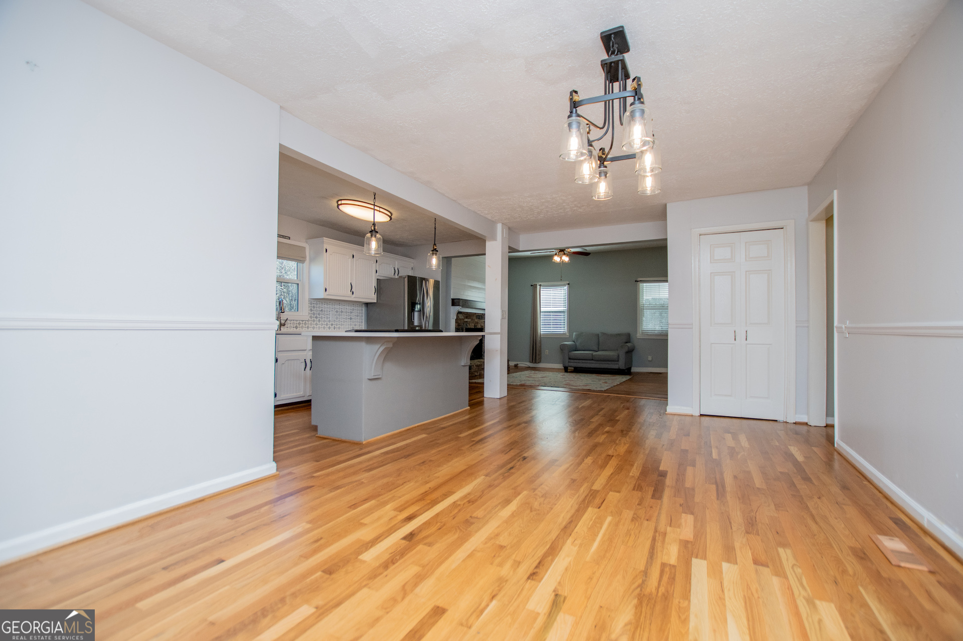 1405 Burwell Road Carrollton, GA 30117 - Photo 14 of 102 a view of a kitchen with wooden floor and a kitchen