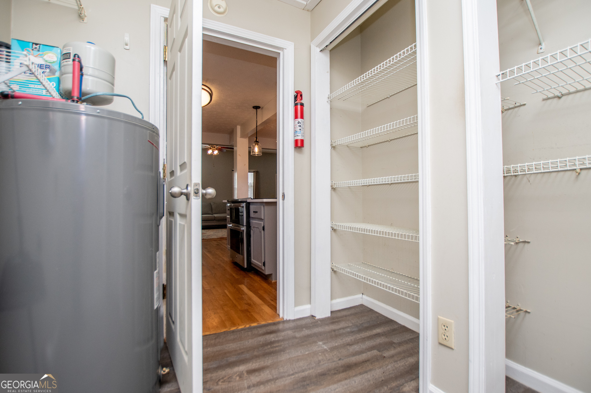1405 Burwell Road Carrollton, GA 30117 - Photo 27 of 102 a view of a hallway with wooden floor and closet