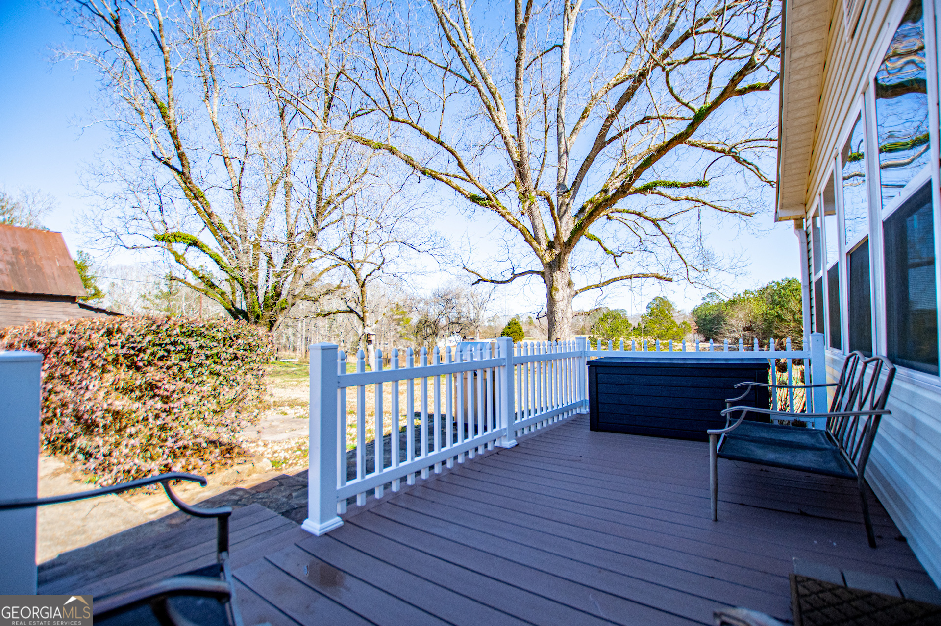 1405 Burwell Road Carrollton, GA 30117 - Photo 55 of 102 a view of a bench in a patio