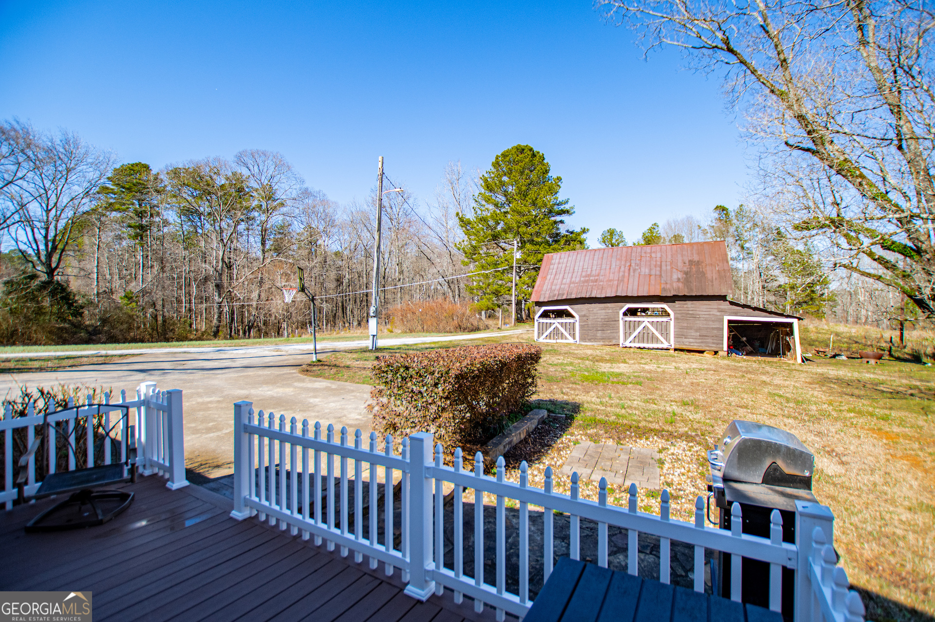 1405 Burwell Road Carrollton, GA 30117 - Photo 58 of 102 a view of a house with wooden fence