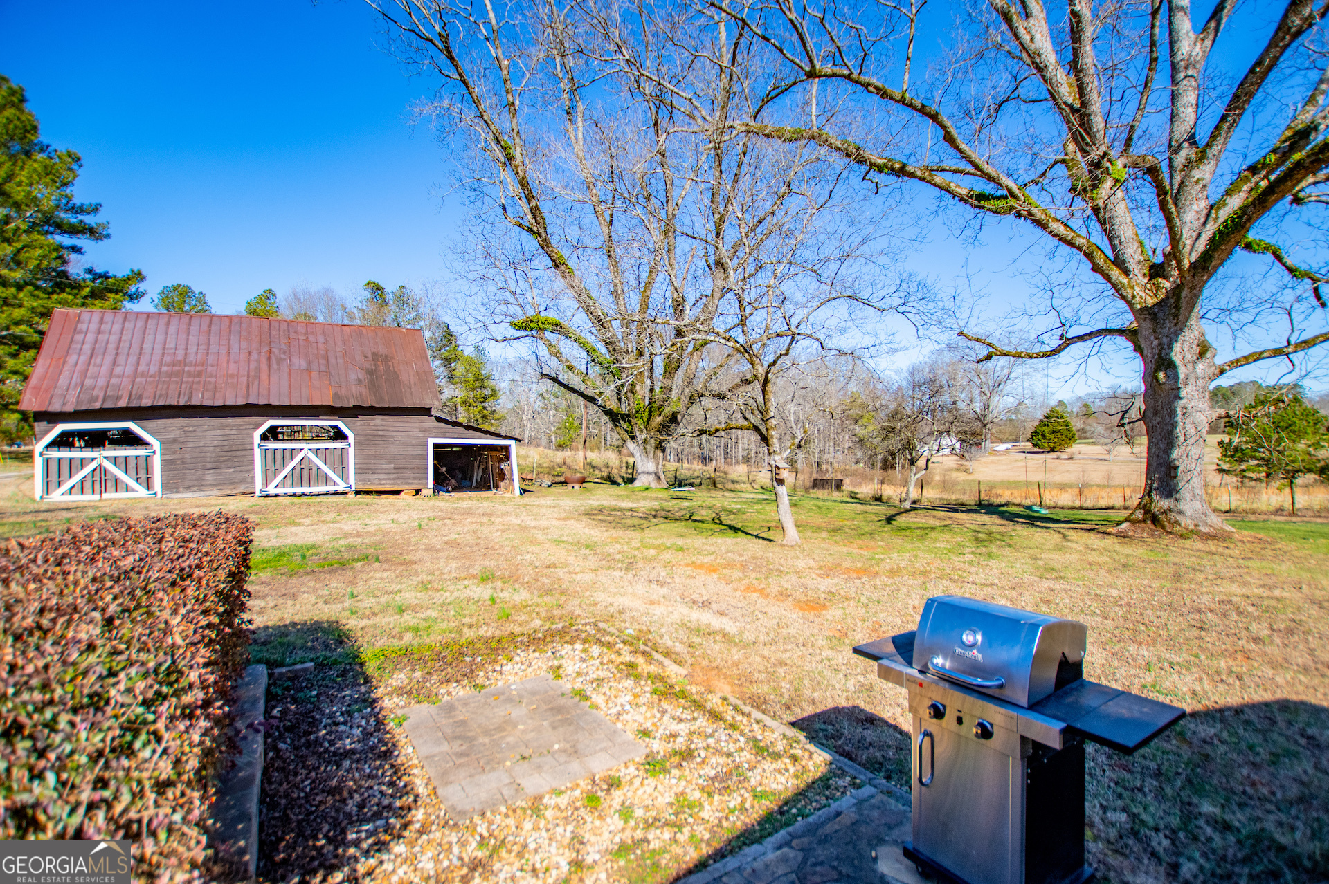 1405 Burwell Road Carrollton, GA 30117 - Photo 60 of 102 a view of a yard with a house