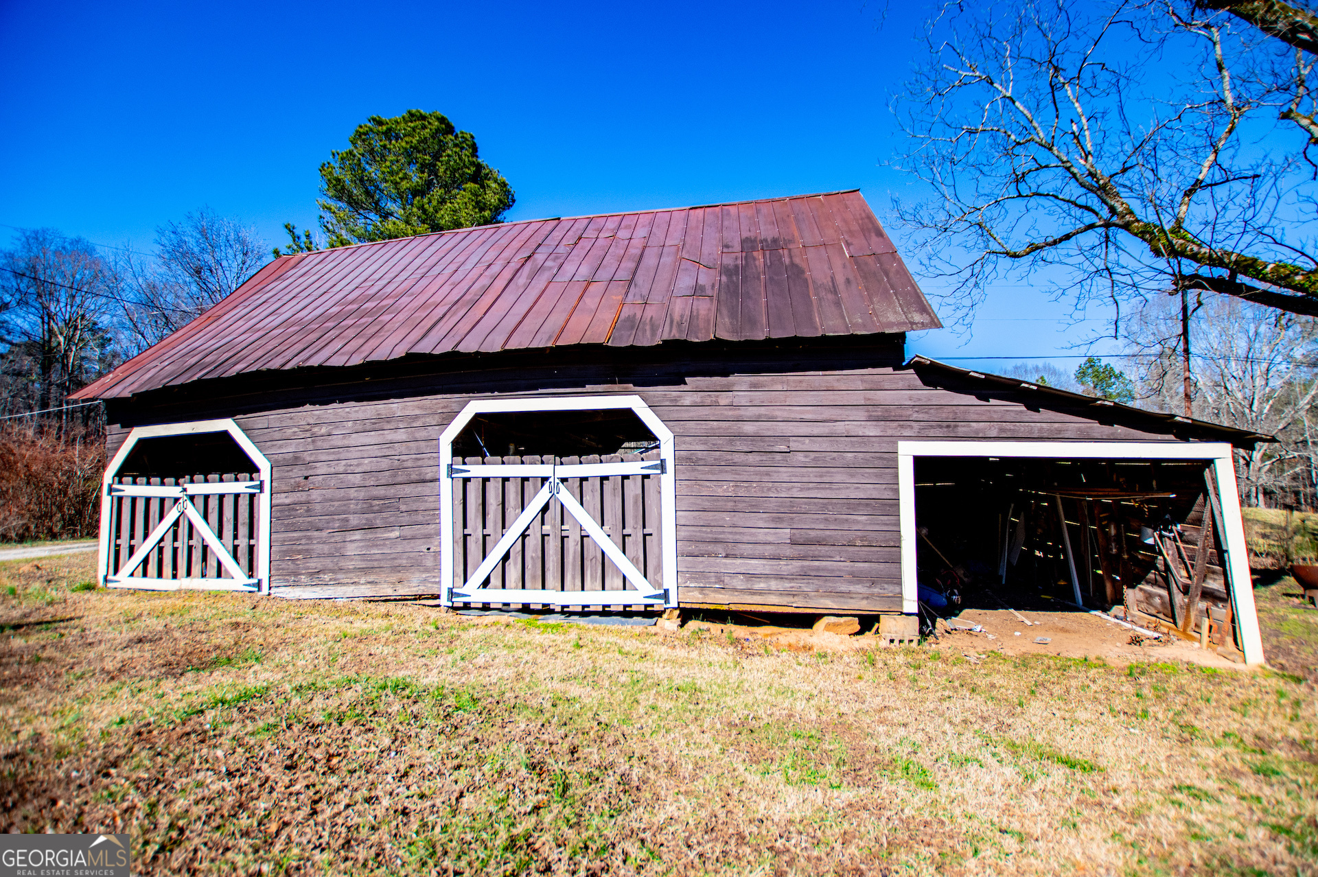 1405 Burwell Road Carrollton, GA 30117 - Photo 63 of 102 a front view of a house with a yard