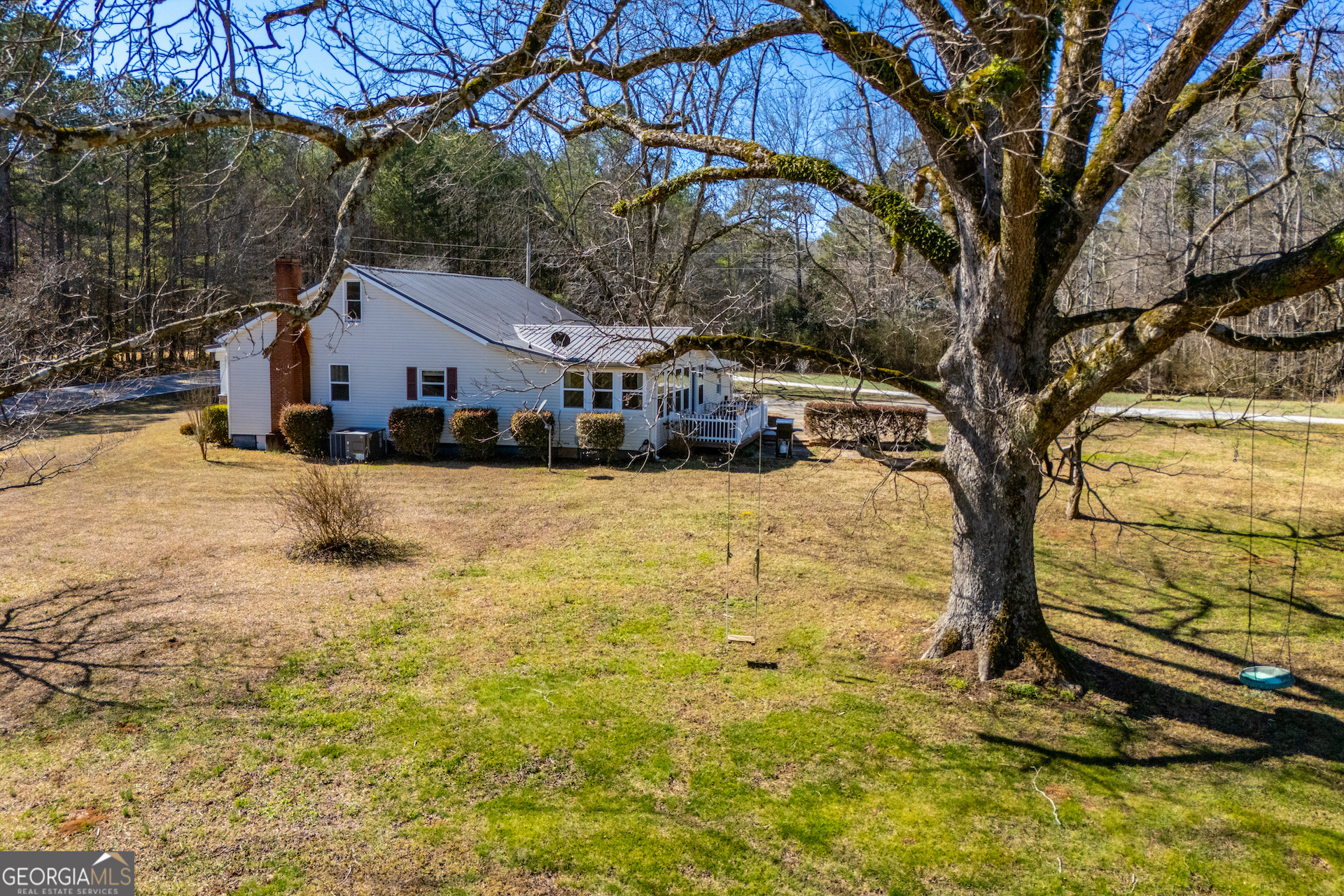 1405 Burwell Road Carrollton, GA 30117 - Photo 72 of 102 a view of a house with a yard