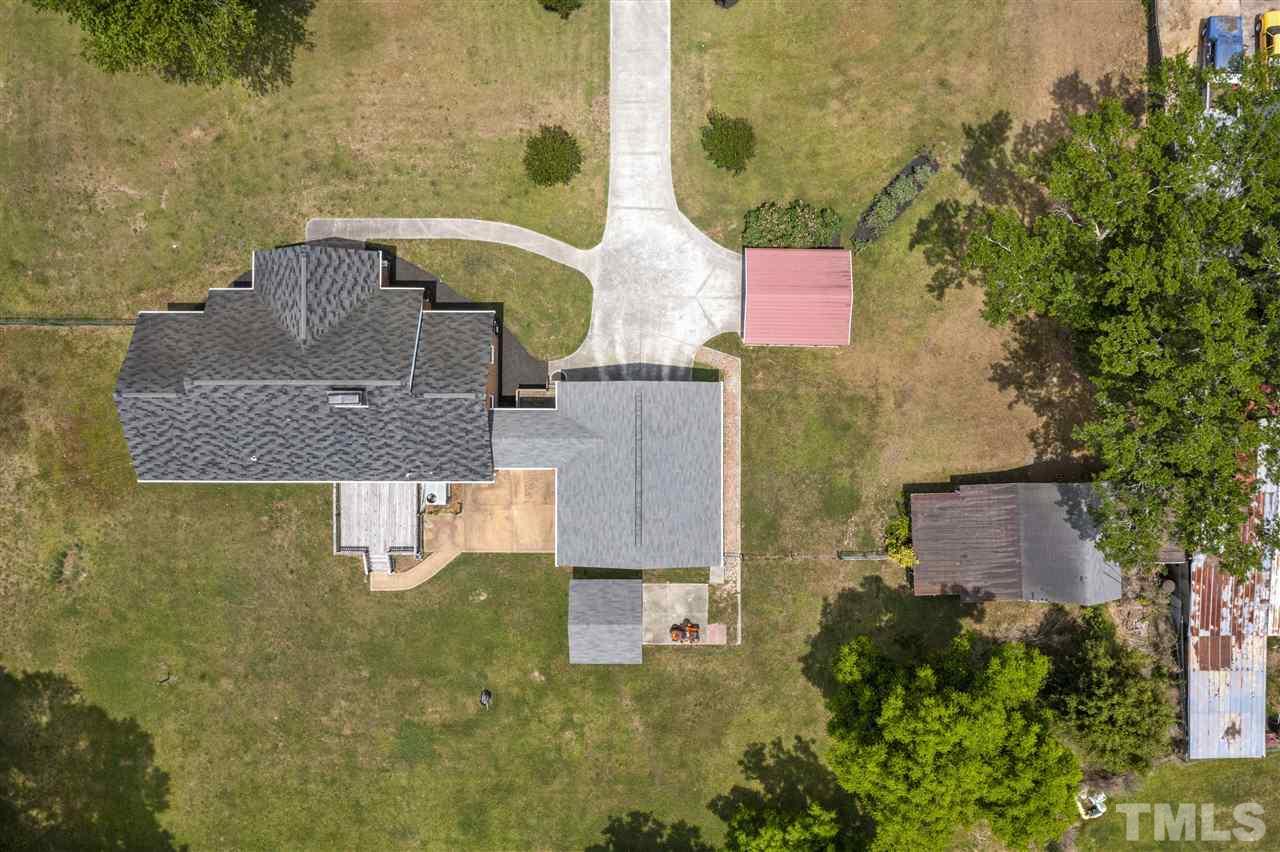 2403 Erwin Road Dunn, NC 28334 - Photo 22 of 23 This shows the yard and the location of the shed, barn, carport, patio, and deck.