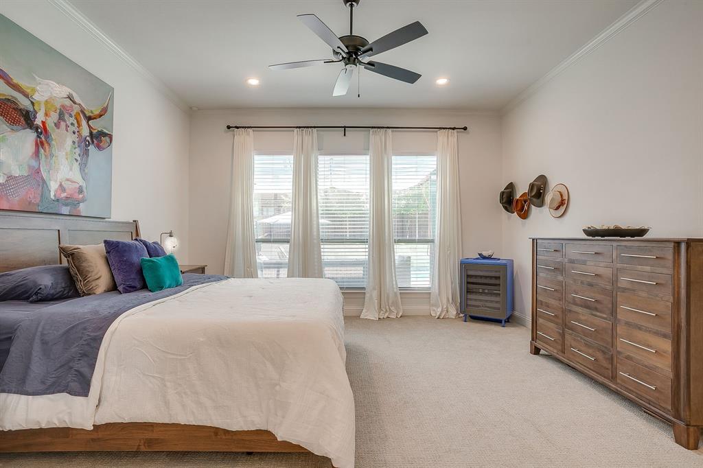 413 Kestrel Court Aledo, TX 76008 - Photo 23 of 40 a bedroom with a bed dresser and a window