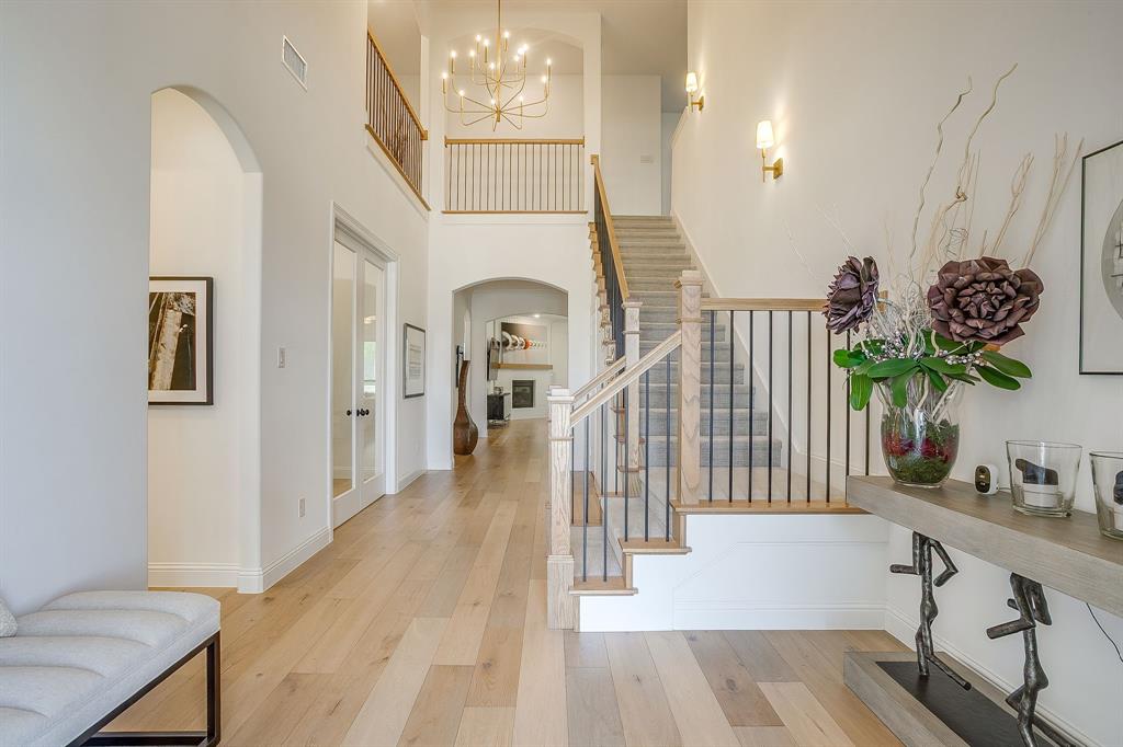 413 Kestrel Court Aledo, TX 76008 - Photo 5 of 40 a view of entryway and hall with wooden floor