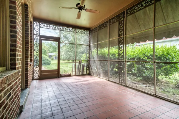 a view of a room with a large window
