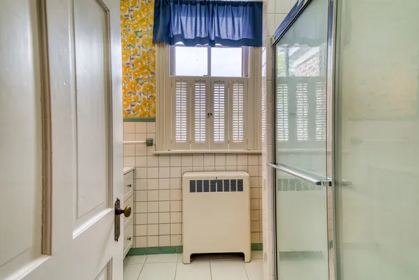 a bathroom with a sink and a shower