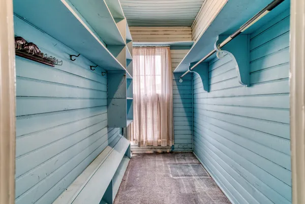 an empty room with windows