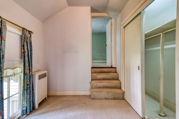 an empty room with windows