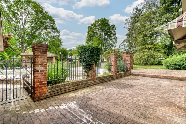 a view of a backyard of the house