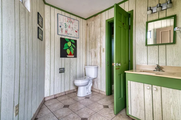 a view of a door and wooden floor