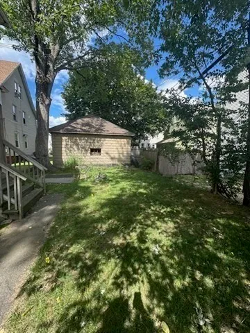 a view of a trees with a yard