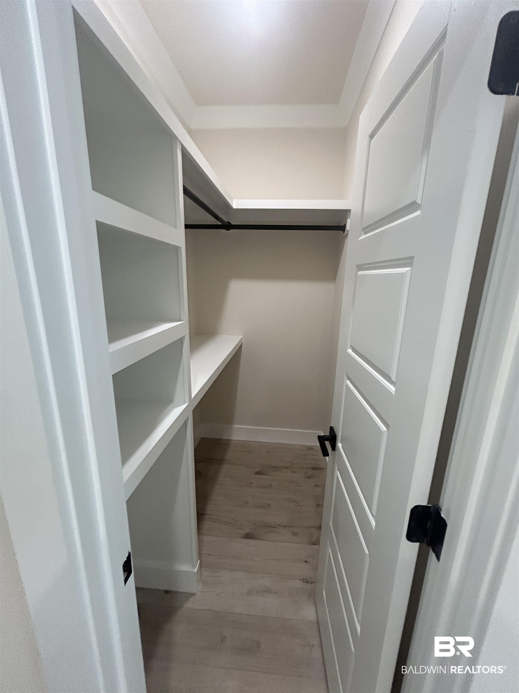 5122 Pine Road Orange Beach, AL 36561 - Photo 21 of 24 Walk in closet featuring light wood-type flooring
