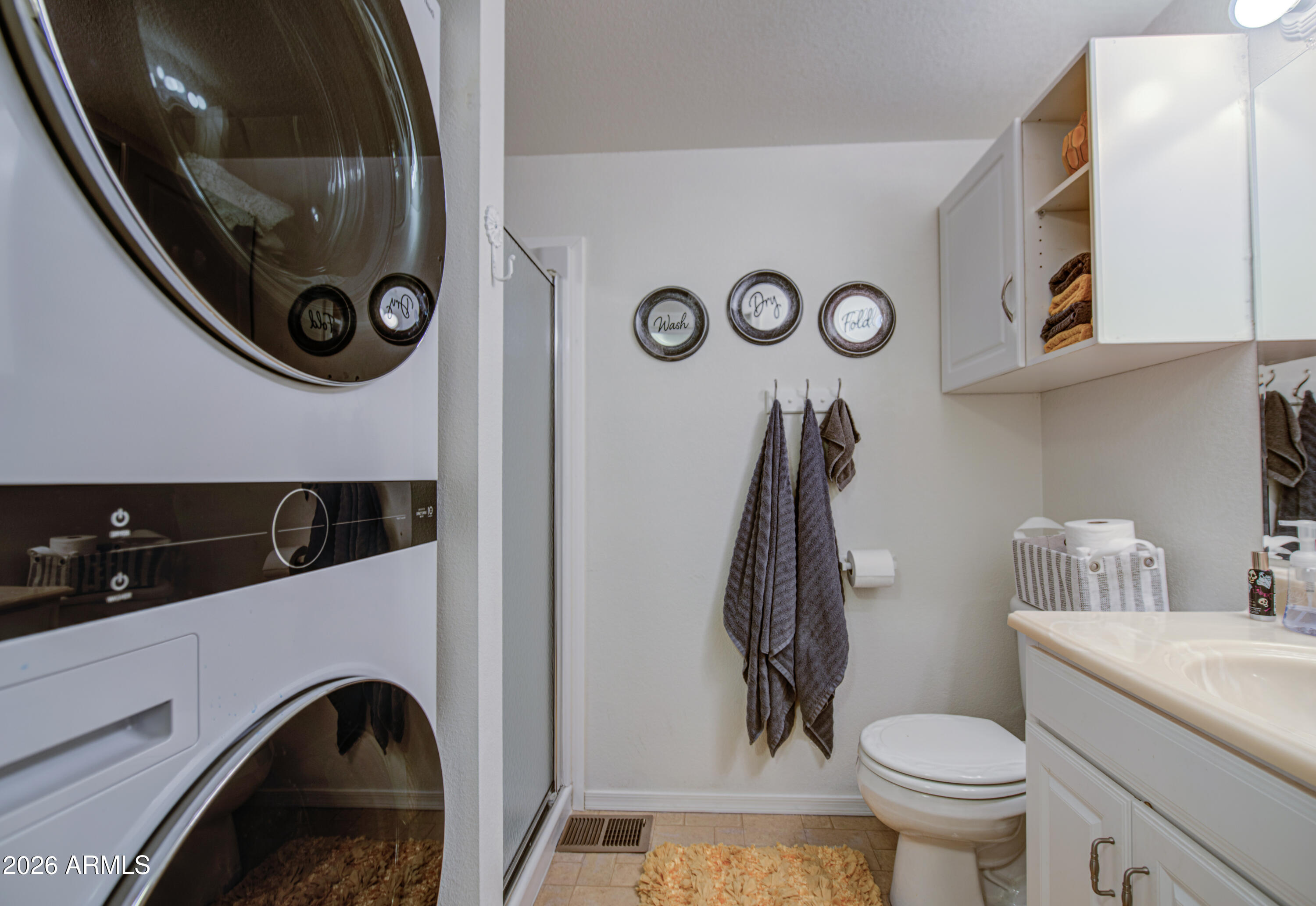 7750 East Broadway Road, Unit 349 Mesa, AZ 85208 - Photo 21 of 39 a bathroom with a toilet and a sink