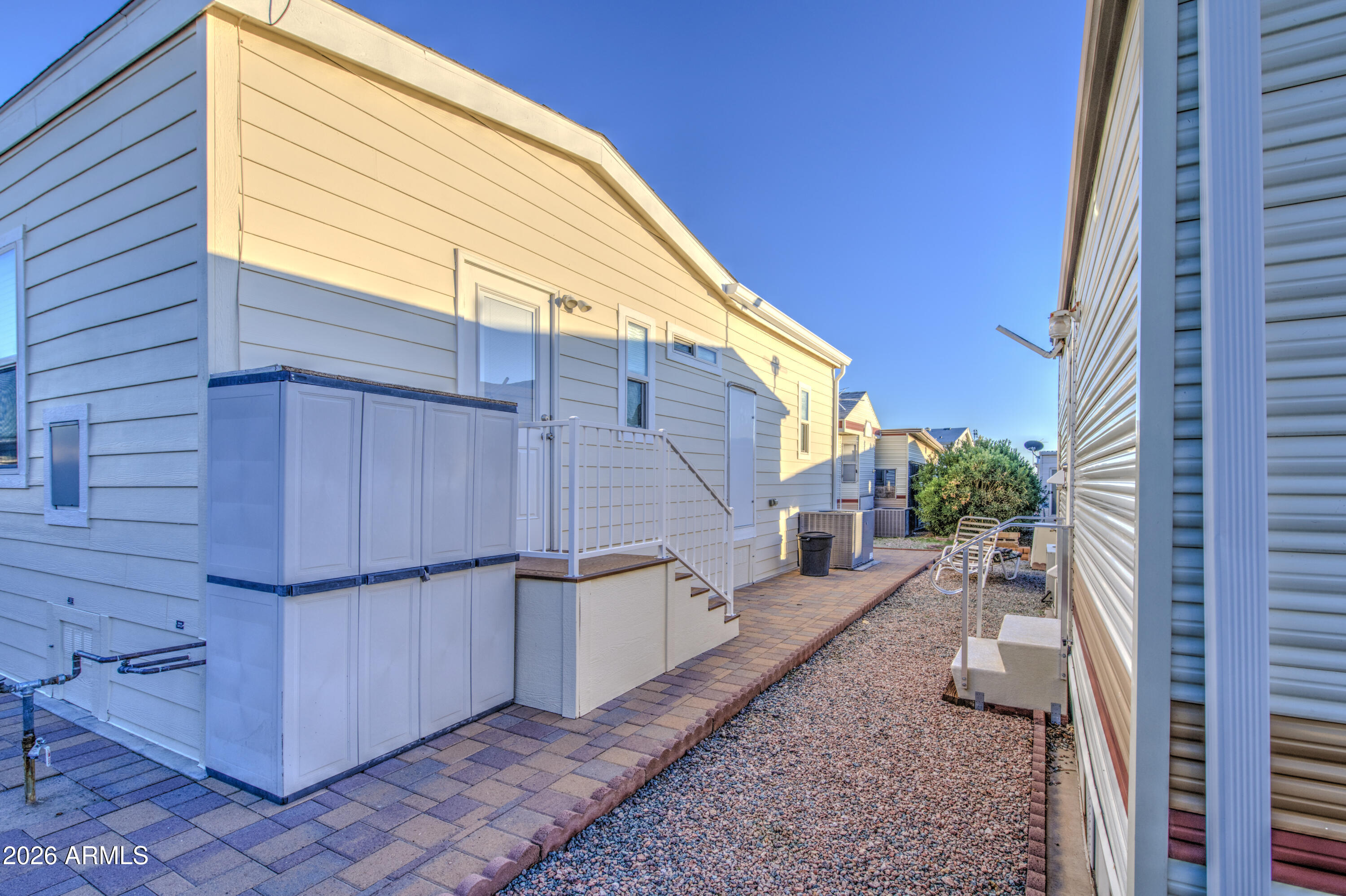7750 East Broadway Road, Unit 349 Mesa, AZ 85208 - Photo 26 of 39 a backyard of a house
