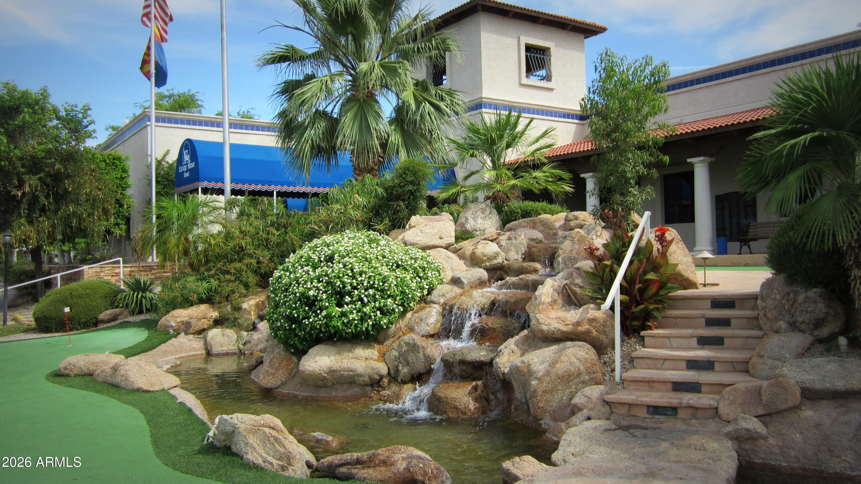 7750 East Broadway Road, Unit 349 Mesa, AZ 85208 - Photo 29 of 39 a view of a house with backyard and sitting area