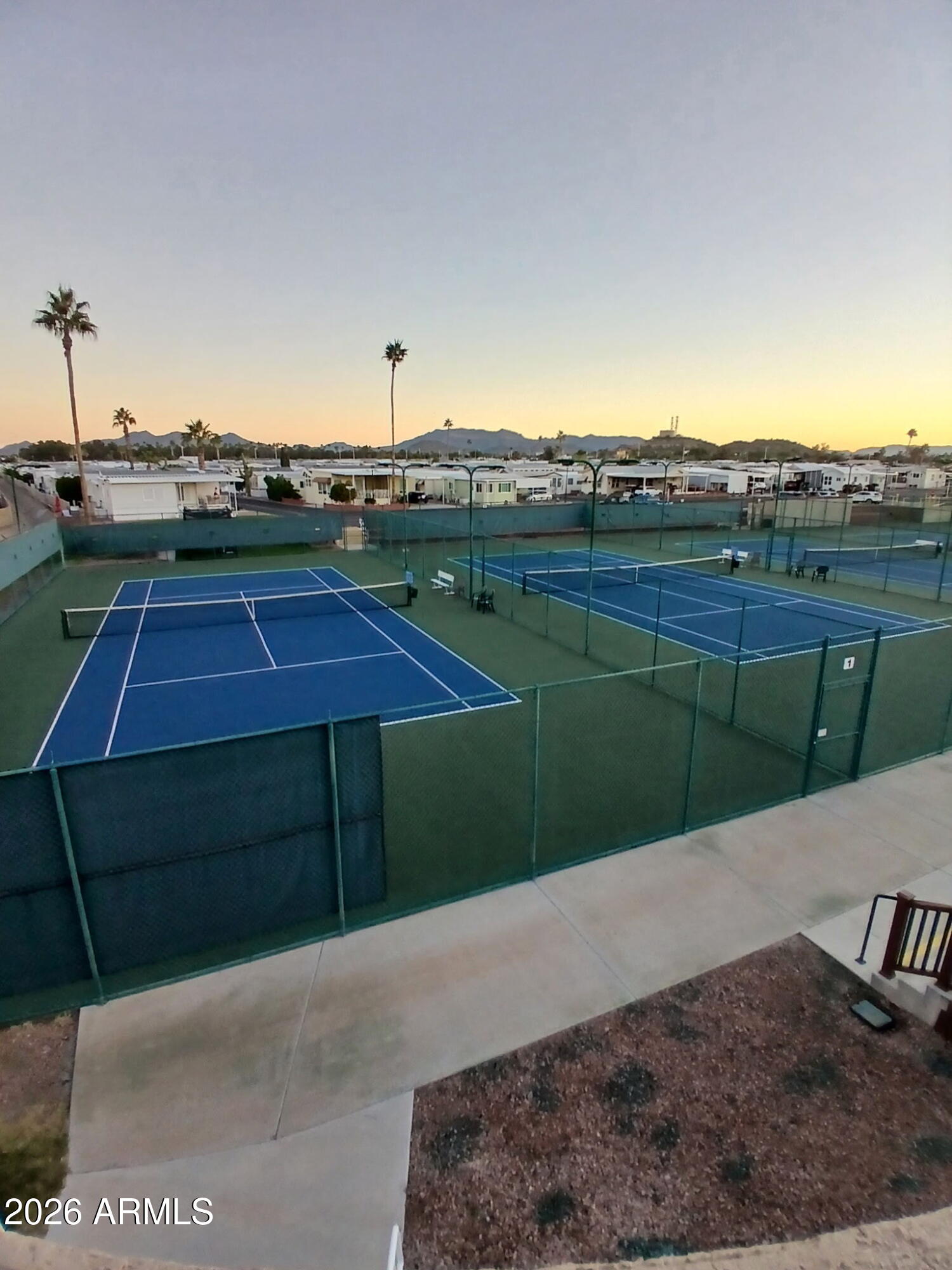 7750 East Broadway Road, Unit 349 Mesa, AZ 85208 - Photo 33 of 39 a view of a yard in front of a house