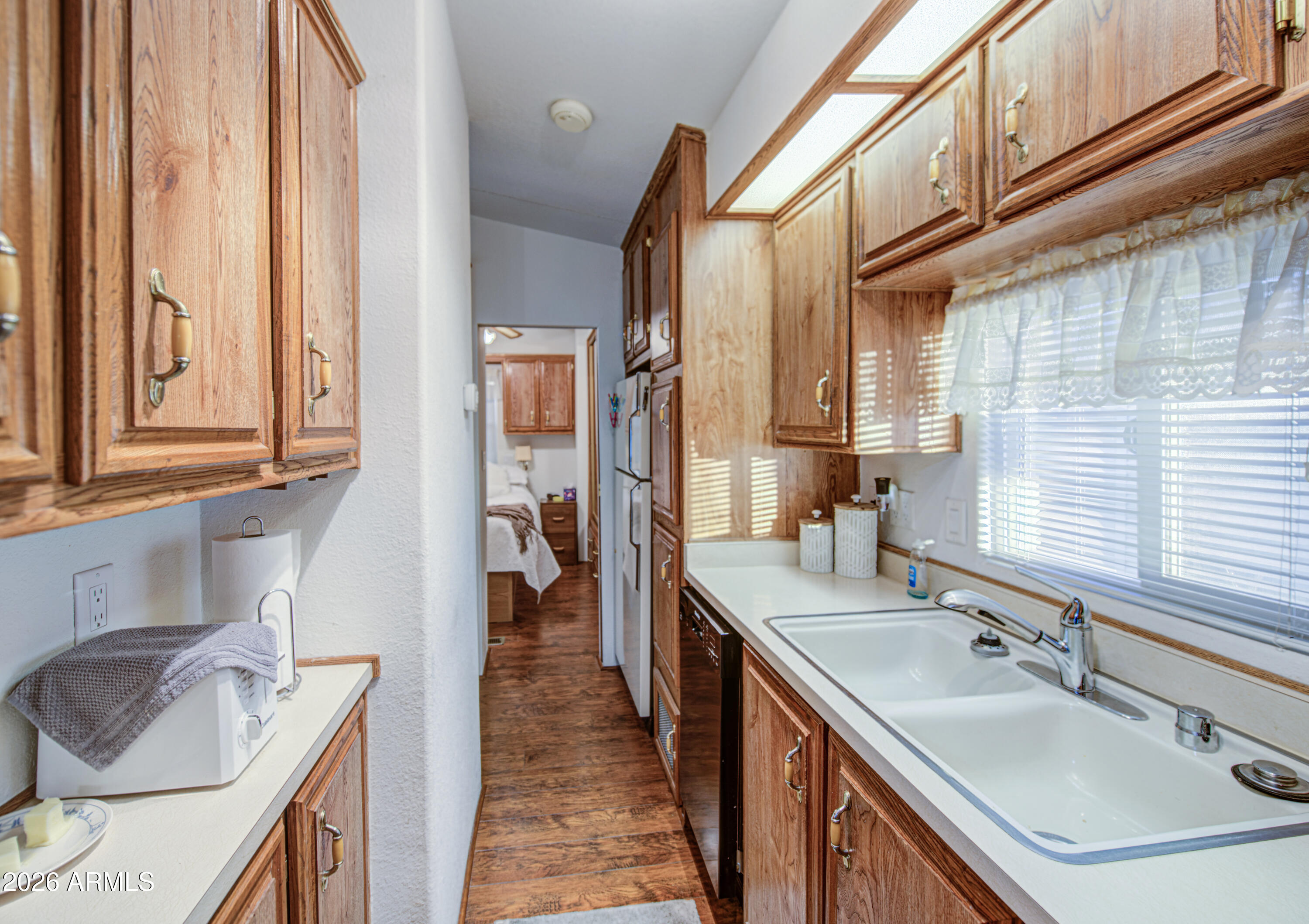 7750 East Broadway Road, Unit 349 Mesa, AZ 85208 - Photo 6 of 39 a bathroom with a sink a vanity and a bathtub