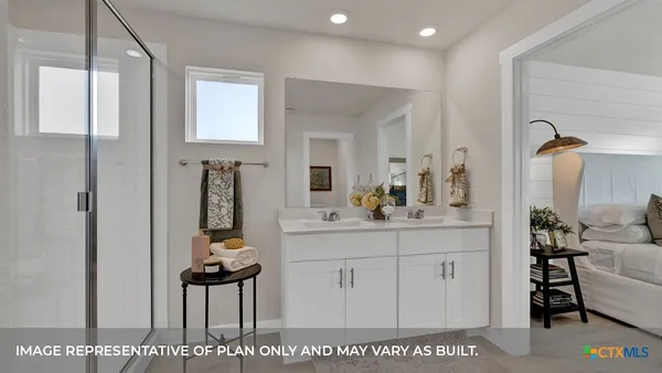 a spacious bathroom with a sink a mirror and shower