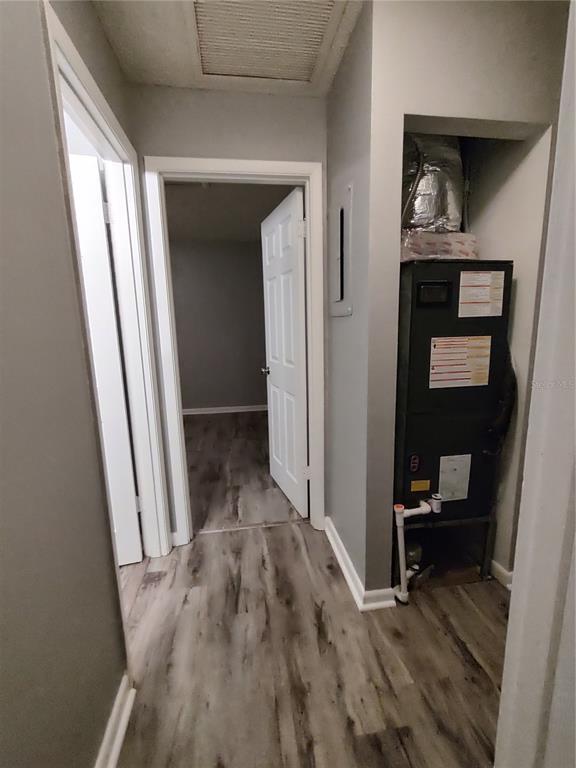 200 Church Street, Unit F2 Leesburg, FL 34748 - Photo 16 of 23 a view of a hallway and wooden floor