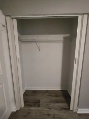 a view of an empty walk in closet