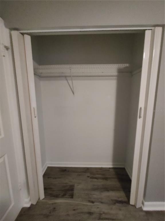 200 Church Street, Unit F2 Leesburg, FL 34748 - Photo 19 of 23 a view of an empty walk in closet