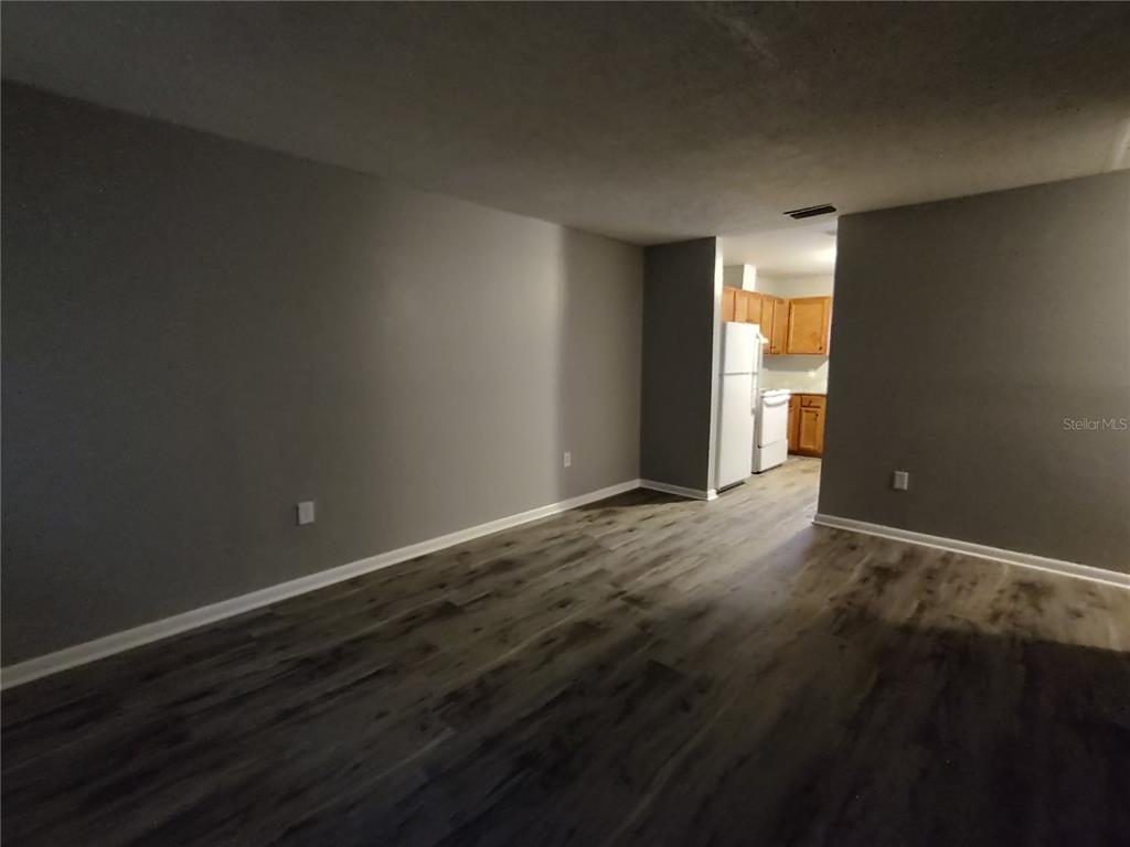 200 Church Street, Unit F2 Leesburg, FL 34748 - Photo 4 of 23 a view of an empty room and window