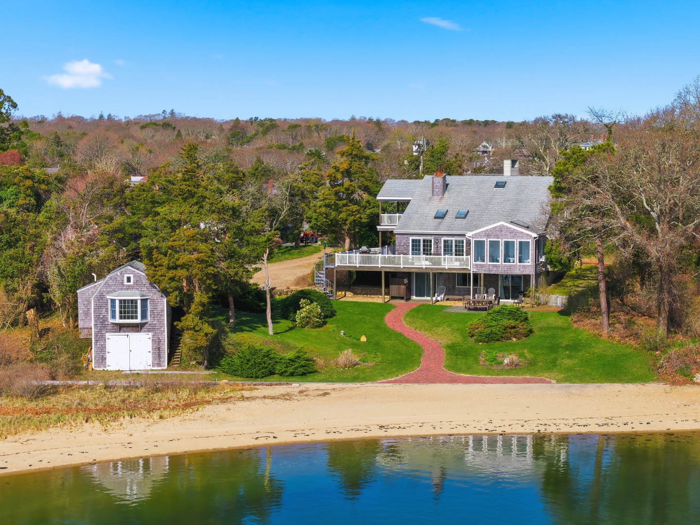 95 Hines Point Road Vineyard Haven, MA 02568 - Photo 1 of 36 a view of houses with a lake and city view