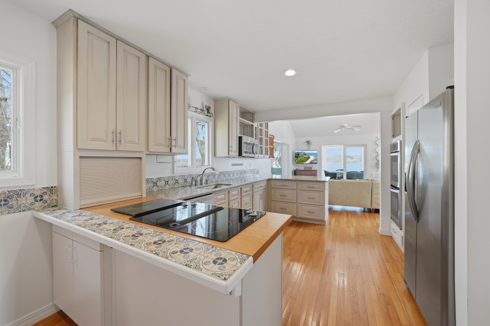 95 Hines Point Road Vineyard Haven, MA 02568 - Photo 11 of 36 a kitchen that has a sink and a oven
