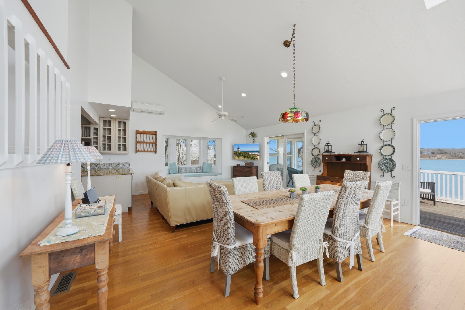 95 Hines Point Road Vineyard Haven, MA 02568 - Photo 13 of 36 a dining room with furniture and wooden floor