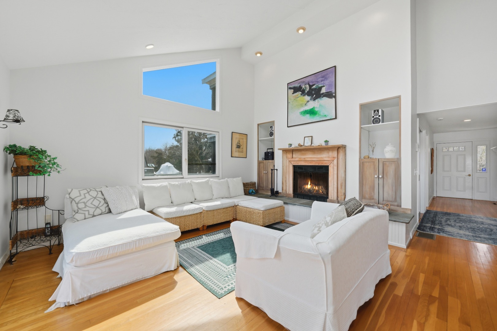 95 Hines Point Road Vineyard Haven, MA 02568 - Photo 14 of 36 a living room with furniture and a fireplace