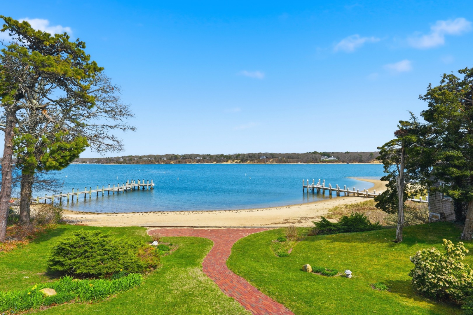 95 Hines Point Road Vineyard Haven, MA 02568 - Photo 15 of 36 a view of a lake with a big yard