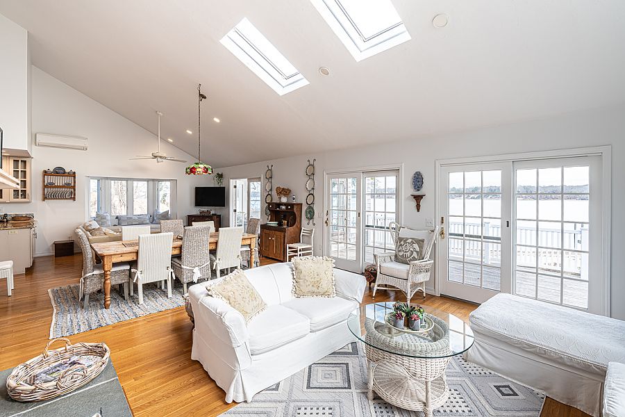 95 Hines Point Road Vineyard Haven, MA 02568 - Photo 15 of 43 a living room with furniture a rug and a large window