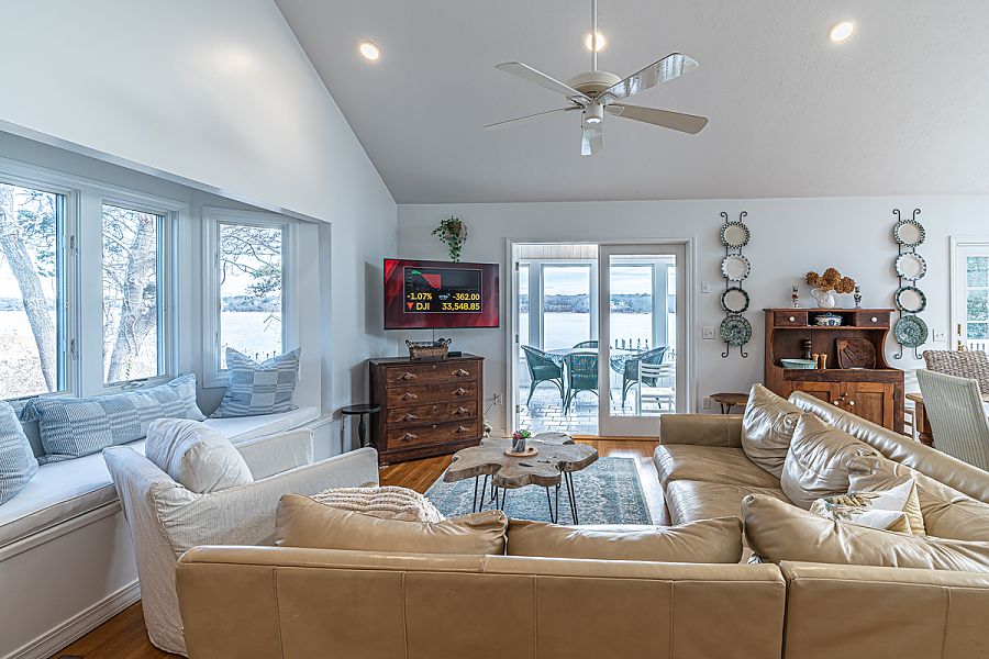 95 Hines Point Road Vineyard Haven, MA 02568 - Photo 16 of 43 a living room with furniture and a fireplace
