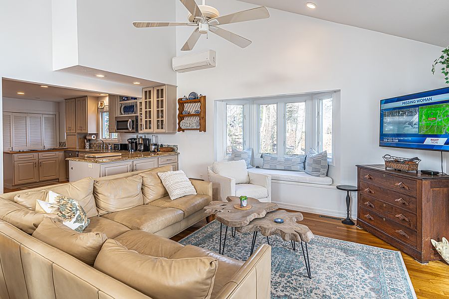 95 Hines Point Road Vineyard Haven, MA 02568 - Photo 17 of 43 a living room with furniture and a flat screen tv
