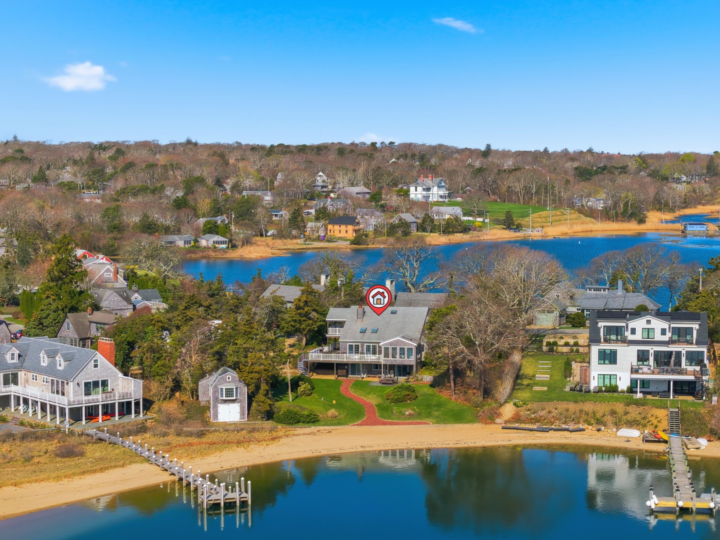 95 Hines Point Road Vineyard Haven, MA 02568 - Photo 2 of 36 an aerial view of residential houses with outdoor space and swimming pool