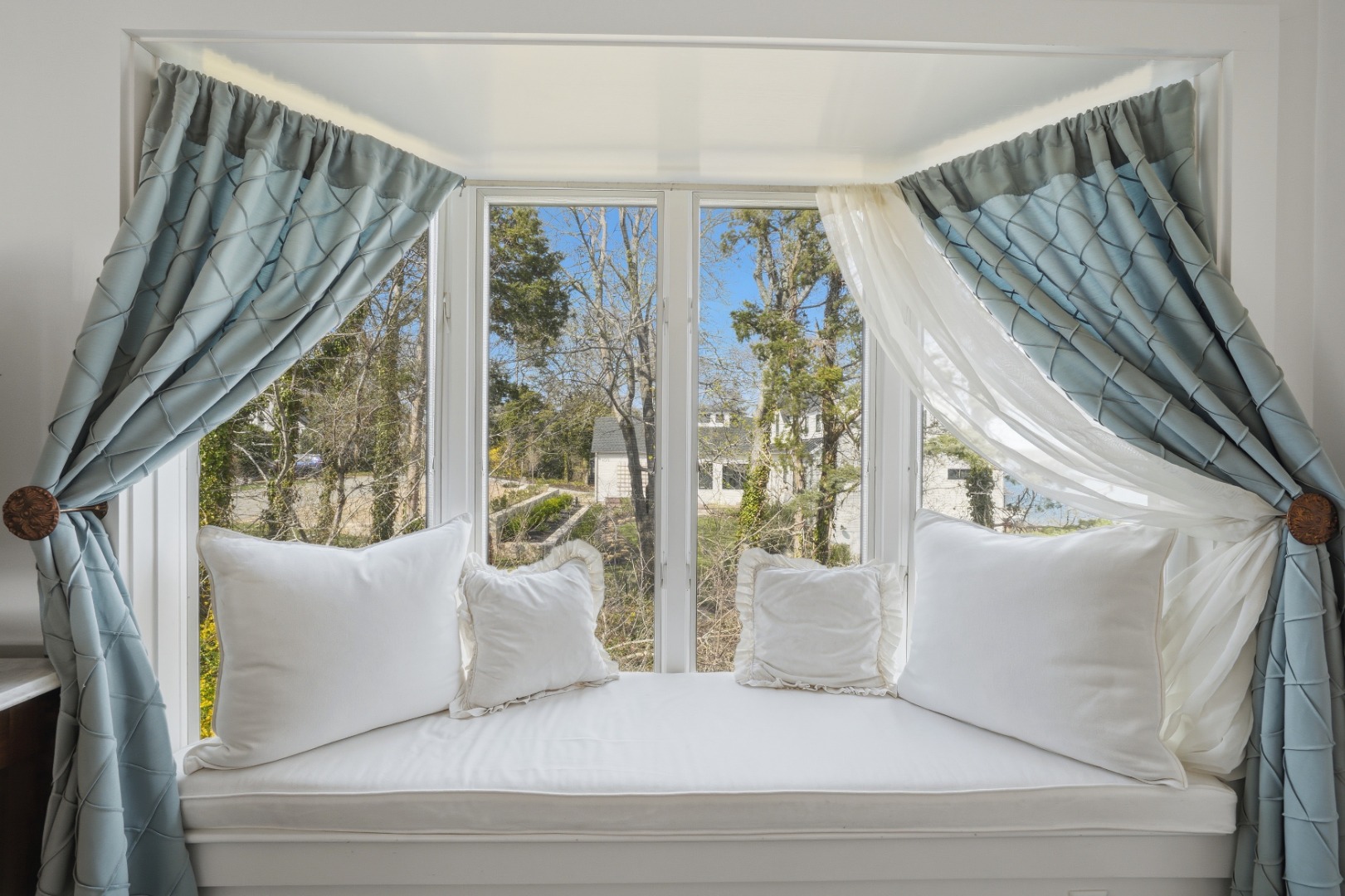 95 Hines Point Road Vineyard Haven, MA 02568 - Photo 23 of 36 a bedroom with a bed and a large window with garden view