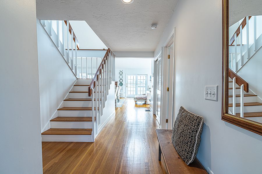95 Hines Point Road Vineyard Haven, MA 02568 - Photo 28 of 43 a view of entryway and hall with wooden floor