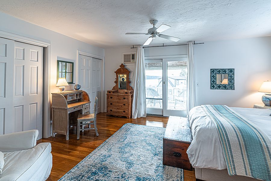 95 Hines Point Road Vineyard Haven, MA 02568 - Photo 33 of 43 a bedroom with furniture and a window