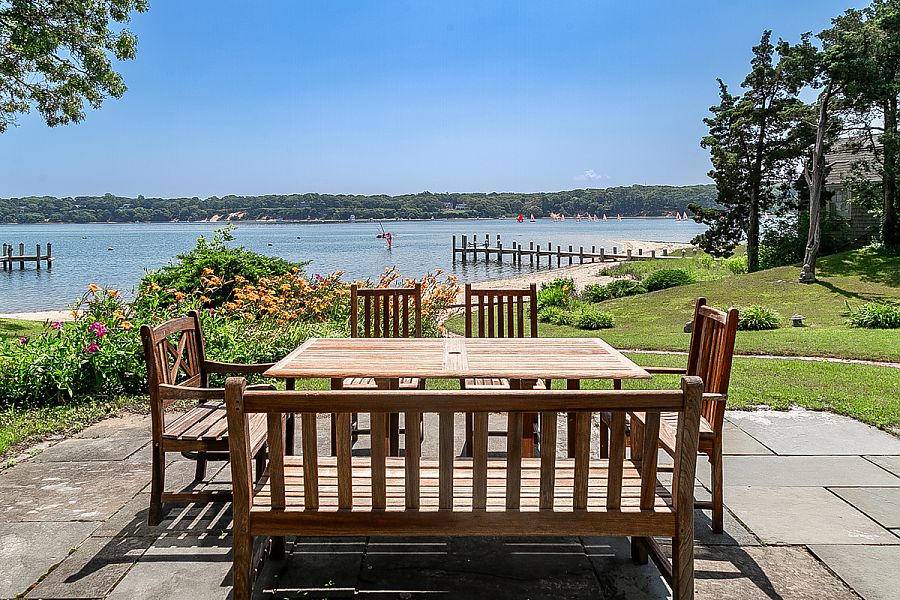 95 Hines Point Road Vineyard Haven, MA 02568 - Photo 8 of 43 a view of a wooden deck with lake view