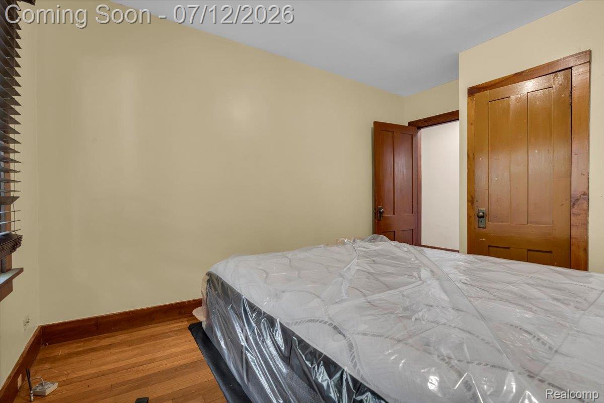 624 North Prospect Road Ypsilanti, MI 48198 - Photo 7 of 28 Hardwood flooring, wood trim, and wood doors