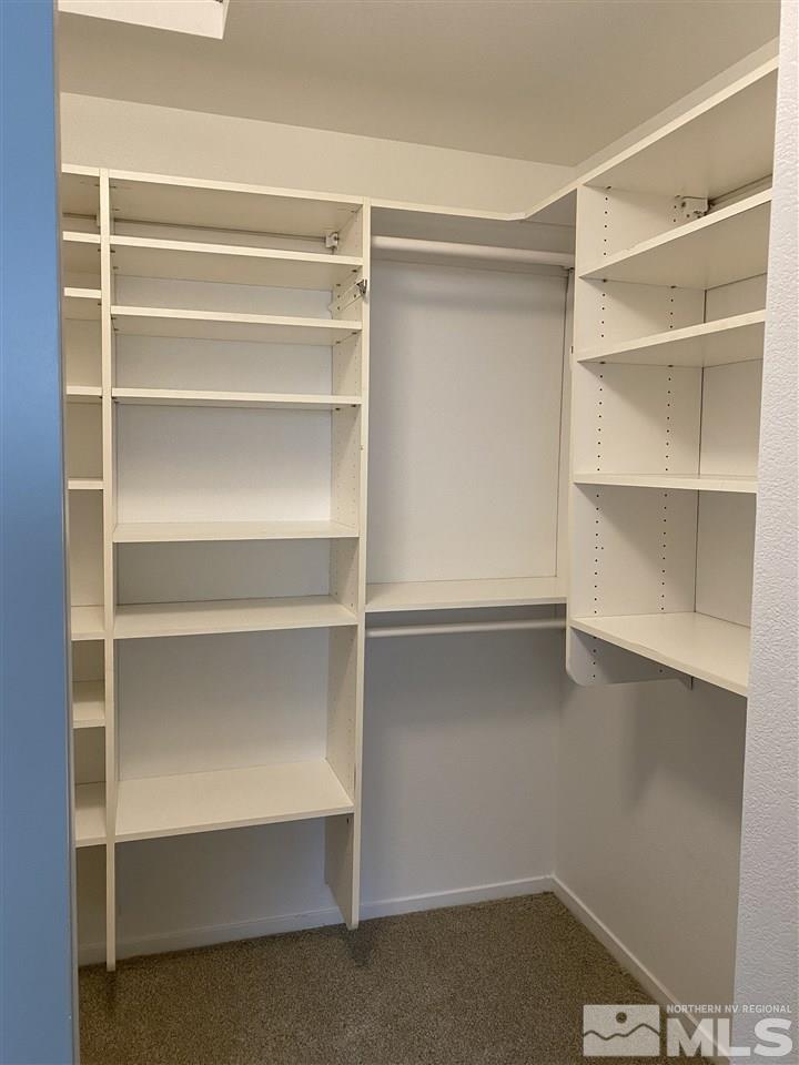 5236 Simons Drive Reno, NV 89523 - Photo 12 of 19 a view of walk in closet with empty racks